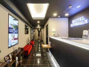 TV a/nebo společenská místnost v ubytování HOTEL LiVEMAX Meieki + 15 fotografií