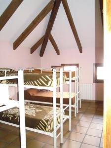 Postel nebo postele na pokoji v ubytování Albergue Albarracín