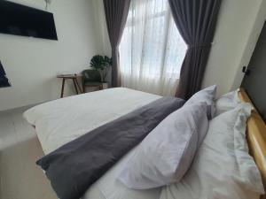 Postel nebo postele na pokoji v ubytování Hello Dalat Hostel