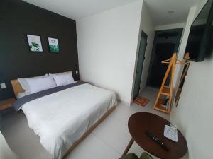 Postel nebo postele na pokoji v ubytování Hello Dalat Hostel