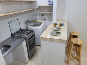Kuchyňa alebo kuchynka v ubytovaní Romulo Ap2