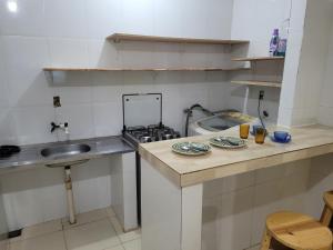 Nhà bếp/bếp nhỏ tại Romulo Ap2
