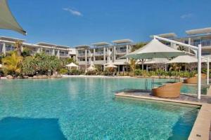The swimming pool at or close to Peppers Salt Resort & Spa - Lagoon pool access 2 br spa suite
