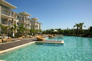 The swimming pool at or close to Peppers Salt Resort & Spa - Lagoon pool access 2 br spa suite