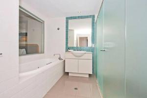 A bed or beds in a room at Peppers Salt Resort & Spa - Lagoon pool access 2 br spa suite