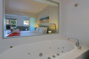 A bathroom at Peppers Salt Resort & Spa - Lagoon pool access 2 br spa suite