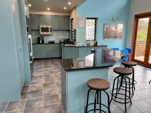 A kitchen or kitchenette at Sails to Sea - 4 Bedroom Pet Friendly Private Pool