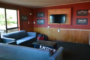 TV o dispositivi per l'intrattenimento presso Chateau Backpackers & Motels