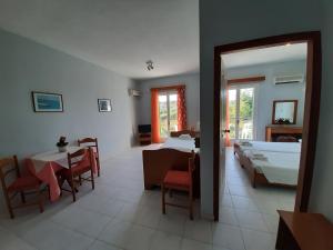 Postel nebo postele na pokoji v ubytování Ammousa Hotel Apartments
