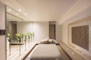 Кровать или кровати в номере The Residence Mauritius