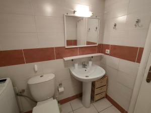 Koupelna v ubytování ML Saroko Apartment + 12 fotografií