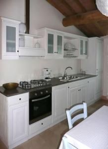 Kuchyň nebo kuchyňský kout v ubytování Holiday home Cielsereno
