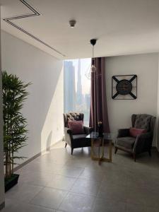 منطقة جلوس في GUEST READY - Luxury One Bedroom Apartment DIFC Burj Khalifa View