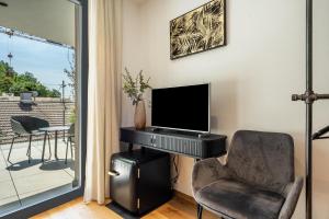 TV a/nebo společenská místnost v ubytování Videre Doppelzimmer