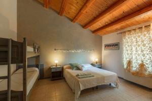 Posteľ alebo postele v izbe v ubytovaní La Meriggia Senigallia Agriturismo