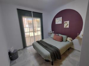 Postel nebo postele na pokoji v ubytování Precioso apartamento con piscina cerca de la playa TORROX COSTA