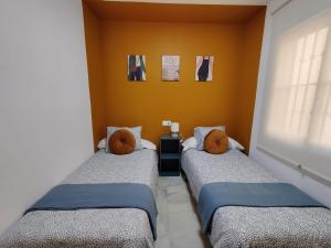 Postel nebo postele na pokoji v ubytování Precioso apartamento con piscina cerca de la playa TORROX COSTA + 22 fotografií