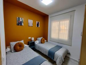 Postel nebo postele na pokoji v ubytování Precioso apartamento con piscina cerca de la playa TORROX COSTA