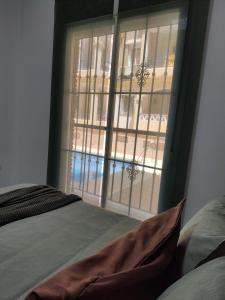 Postel nebo postele na pokoji v ubytování Precioso apartamento con piscina cerca de la playa TORROX COSTA