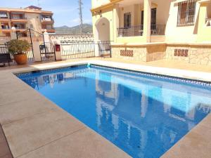 Bazén v ubytování Precioso apartamento con piscina cerca de la playa TORROX COSTA nebo v jeho okolí