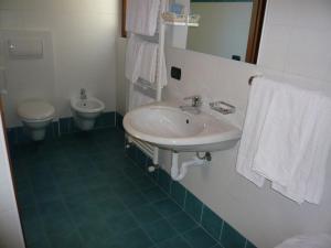 Koupelna v ubytování Hotel Rezia