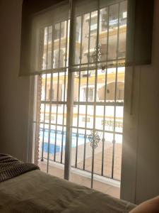 Bazén v ubytování Precioso apartamento con piscina cerca de la playa TORROX COSTA nebo v jeho okolí