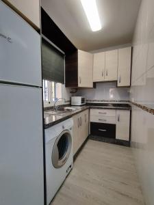 Kuchyň nebo kuchyňský kout v ubytování Precioso apartamento con piscina cerca de la playa TORROX COSTA