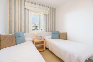 Posteľ alebo postele v izbe v ubytovaní Magnífico apartamento en el Rincón by Renthas