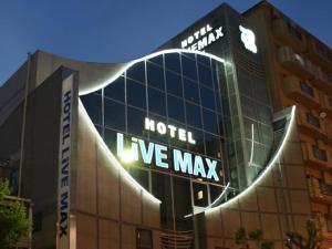 a building with a sign that reads hotel ive max at HOTEL LiVEMAX BUDGET Esaka in Suita