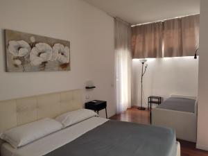 A bed or beds in a room at Tre R