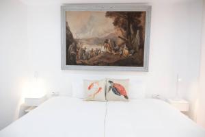 Łóżko lub łóżka w pokoju w obiekcie Lujoso y amplio piso con 5 habitaciones
