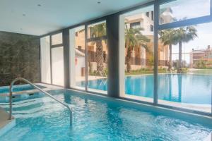 The swimming pool at or close to SEA VIEW 2 BDR Apartment Allonbay Village & SPA Még 10 kép