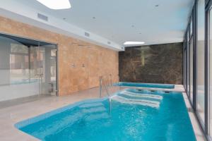 The swimming pool at or close to SEA VIEW 2 BDR Apartment Allonbay Village & SPA