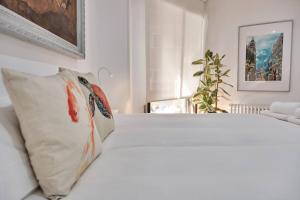 Łóżko lub łóżka w pokoju w obiekcie Lujoso y amplio piso con 5 habitaciones