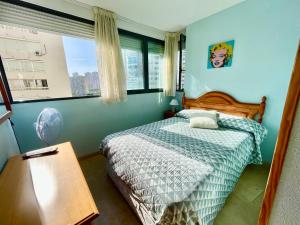 A bed or beds in a room at Apartamento Kennedy 2 by Gestaltur
