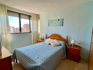 A bed or beds in a room at Apartamento Kennedy 2 by Gestaltur