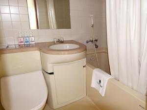 HOTEL LiVEMAX BUDGET Esaka的一间浴室