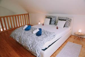 Кровать или кровати в номере IV-AN