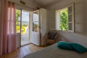 Postel nebo postele na pokoji v ubytování Domaine de La Font des Pères - Teritoria