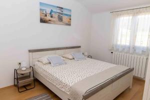Posteľ alebo postele v izbe v ubytovaní COUNTRY HOUSE NINA