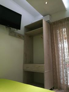 TV a/nebo společenská místnost v ubytování small booking room
