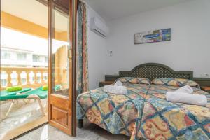 Postel nebo postele na pokoji v ubytování Casa Manolo