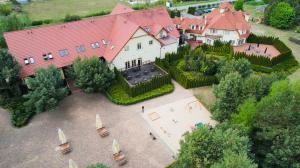 an aerial view of a large house with a large yard at Hotel Marusza in Grudziądz