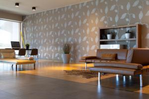 TV a/nebo společenská místnost v ubytování G Hotel Ancona