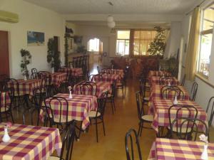 Fotografie z fotogalerie ubytování Aetos Beach Bungalows v destinaci Karystos + 30 fotografií