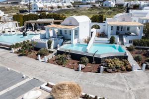 an aerial view of a villa with a swimming pool at Oia Sunset Villas in Oia