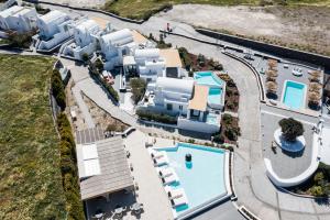 an aerial view of a house with a swimming pool at Oia Sunset Villas in Oia