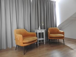 Posezení v ubytování Van der Valk Hotel Emmeloord