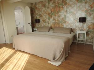 Postel nebo postele na pokoji v ubytování Van der Valk Hotel Emmeloord