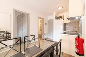Kuchyň nebo kuchyňský kout v ubytování Apartamentos en Torres del Sol